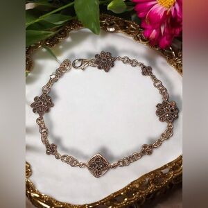 NWT sterling & marcasite floral design 8" link bracelet. Bracelet is stamped